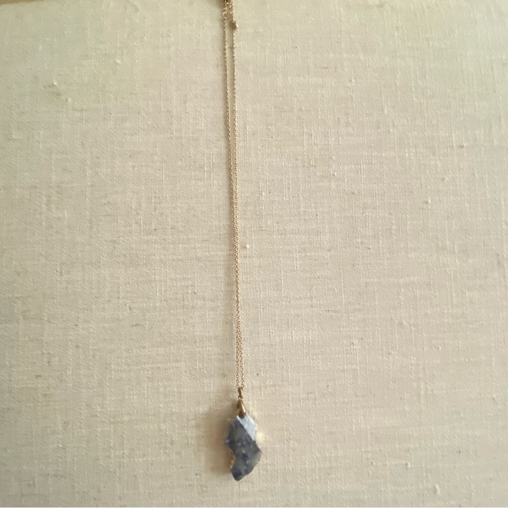 Stone necklace with gold chain and gold wrap